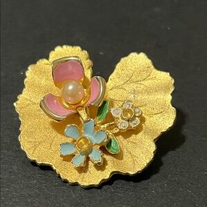 Elegant Gold Floral Brooch with Pink and Blue Accents